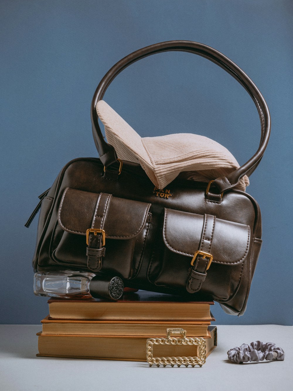 Brown bag on books — sample listing photo, not verified inventory